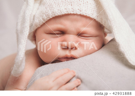 portrait of newborn baby in a hat with ears. 42931888