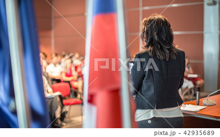Public speaker giving talk at Business Event. 42935689