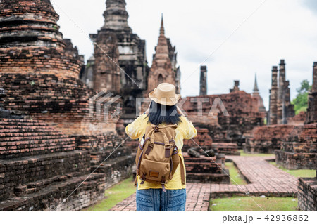 Asian tourist woman take a photo pagoda temple 42936862