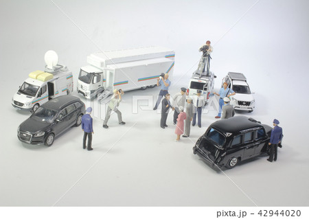 a scale of news report car with figure a scale of news report car with figure 42944020