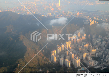 view of plane window looking down of a land 42944055