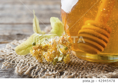 Glass jar of honey, Linden flowers  42945478