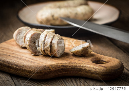 Sliced tasty white sausage. 42947776