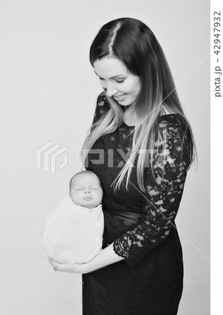 baby on the hands of mother. woman and child 42947932