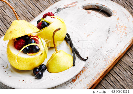 Pear with berry stuffing 42950831