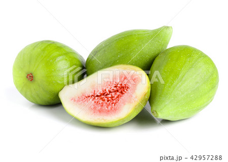 Ripe green fig fruit and half isolated on white background Ripe green fig fruit and half isolated on white background 42957288