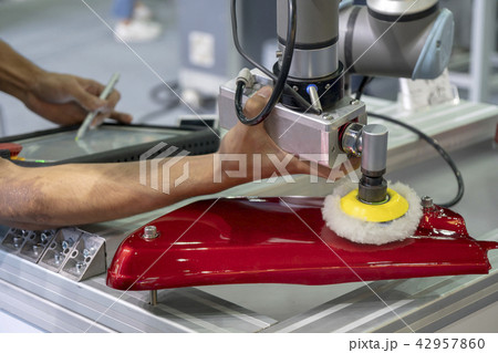 The engineer setup the robot arm 42957860