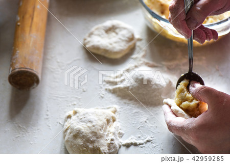 Preparation of pies with potatoes close up Preparation of pies with potatoes close up 42959285