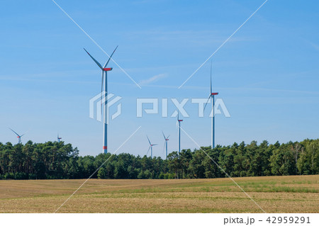 wind turbines / windmills in rural landscape wind turbines / windmills in rural landscape 42959291