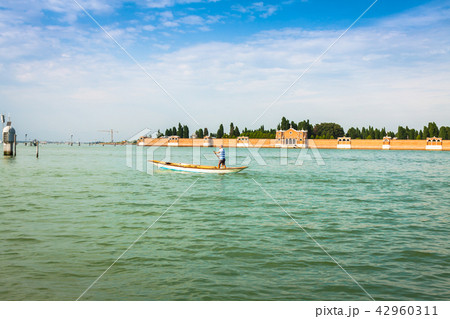 The man on the boat Venice, Italy 42960311
