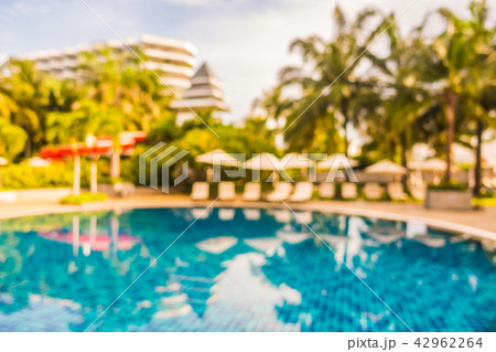 Abstract blur and defocused beautiful outdoor swimming pool in hotel and resort Abstract blur and defocused beautiful outdoor swimming pool in hotel and resort 42962264