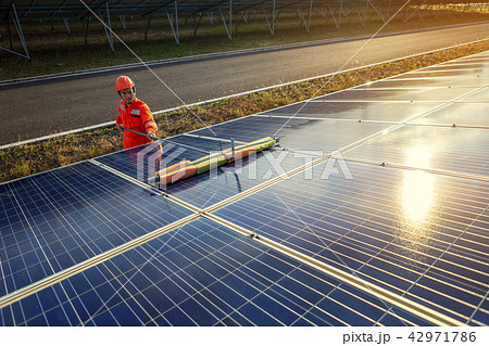 Engineers are checking the solar panel maintenance Engineers are checking the solar panel maintenance 42971786