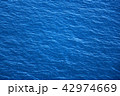 Background of blue sea surface and waves close up 42974669