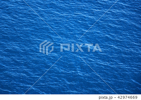 Background of blue sea surface and waves close up 42974669
