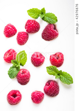 Raspberries and mint on yogurt background 42976876