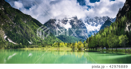 Panoramic image of beautiful Alpine lake  42976889