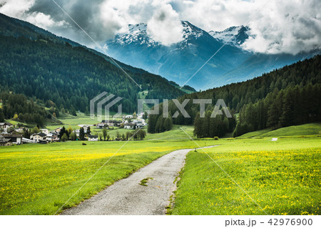 Rural road ito mountain village in Switzerland Rural road ito mountain village in Switzerland 42976900