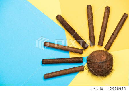 Coconut and cuban cigars, exotic vacations concept 42976956