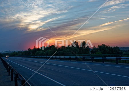 At sunset time on the track. 42977568