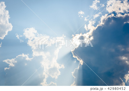 Ray of lights through the clouds 42980452