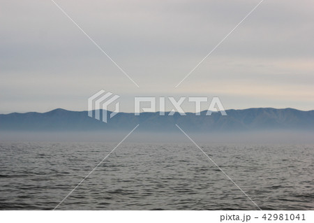 Atmospheric marine landscape with wavy water Atmospheric marine landscape with wavy water 42981041