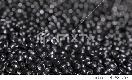 Plastic black gray granulated crumb. Manufacture of plastic water pipes factory. Process of making 42986258