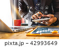 businessman or Designer using smart phone with  42993649