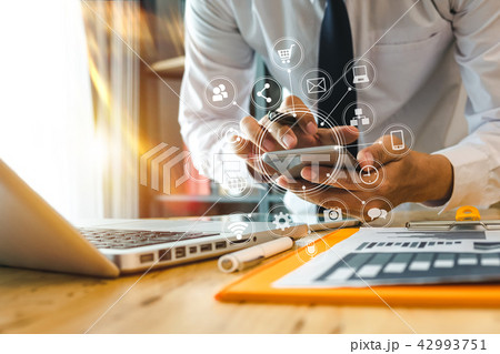 close up of businessman working with smart phone close up of businessman working with smart phone 42993751