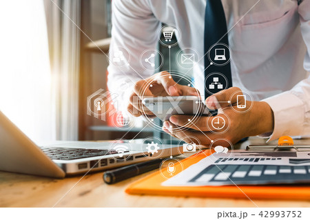 close up of businessman working with smart phone close up of businessman working with smart phone 42993752