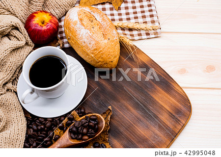 Cup of hot Coffee with toast for Autumn season 42995048