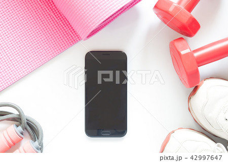 Mobile phone black screen with fitness equipments 42997647