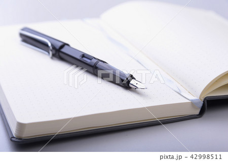 office table with notebook and pen. copy space. 42998511