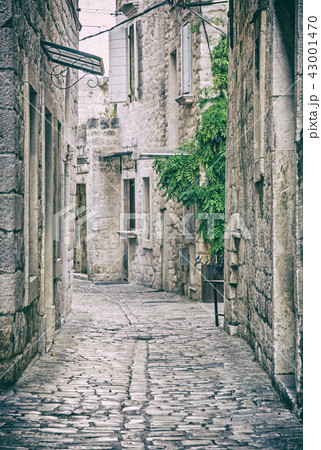 Stoned street in historic Trogir, analog filter 43001470