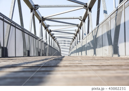 pedestrian transition over the highway . metal bridge pedestrian transition over the highway . metal bridge 43002231