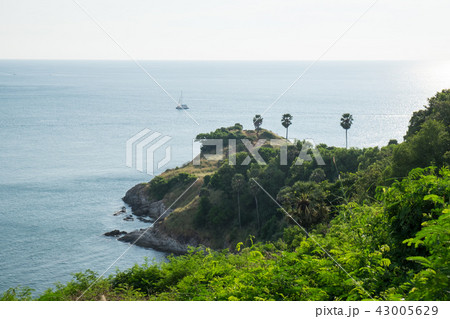 Rocks on the ocean coast at Promthep Cape. 43005629