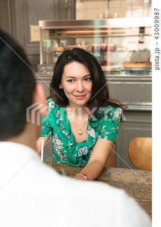 Beautiful woman lovingly looks on her husband 43009987