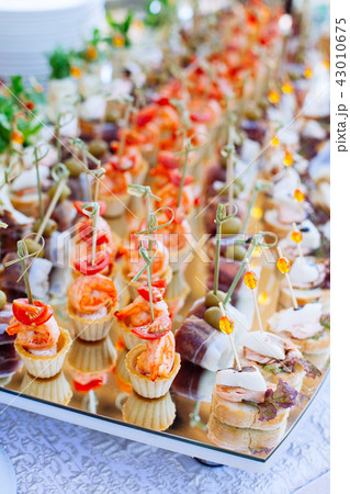catering banquet table with different food snack 43010675