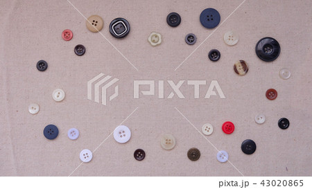 An assortment of round buttons with empty space 43020865