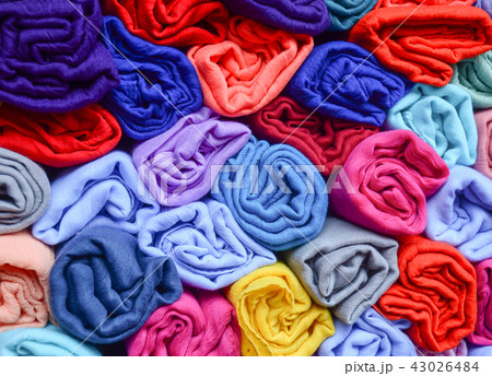 Colorful textile for sale at a street market 43026484