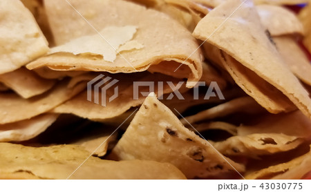 Mexican totopos, hard tortilla or tortilla chips 43030775