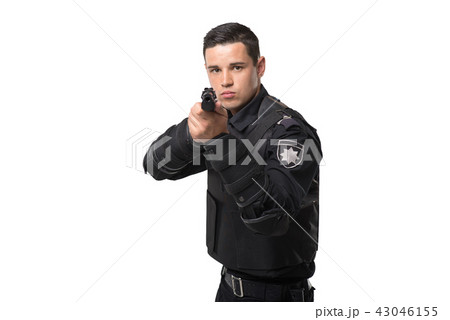Armed police officer aims with a gun 43046155