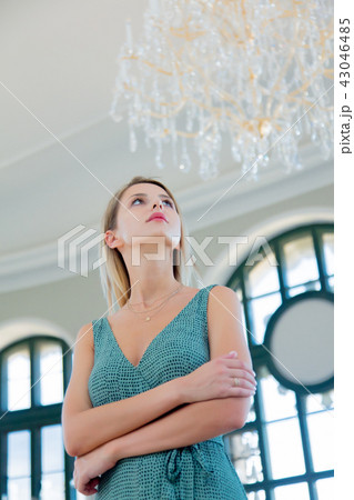 portait of beautiful redhead girl in dreen dress portait of beautiful redhead girl in dreen dress 43046485