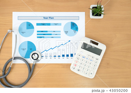 Stethoscope with financial statement, calculator Stethoscope with financial statement, calculator 43050200
