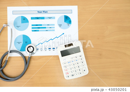 Stethoscope with financial statement, calculator Stethoscope with financial statement, calculator 43050201