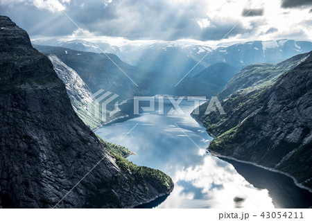 Beautiful fjord in Norway with amazing sun rays. View from the top Beautiful fjord in Norway with amazing sun rays. View from the top 43054211