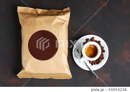 Cup of coffee and vacuum coffee package. Cup of coffee and vacuum coffee package. 43054236
