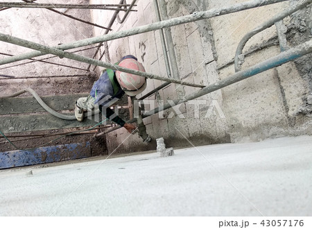 Plastering wall using cement plaster  43057176