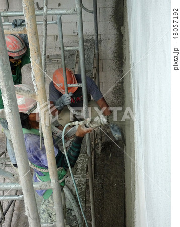 Plastering wall using cement plaster Plastering wall using cement plaster 43057192