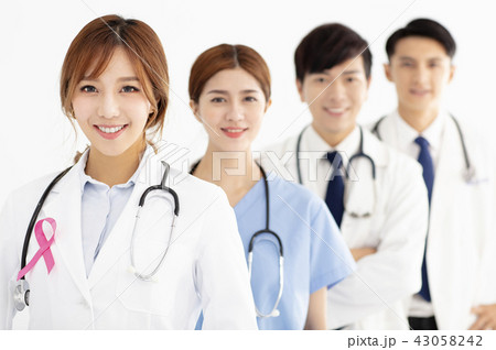 medical team with pink breast cancer awareness medical team with pink breast cancer awareness 43058242