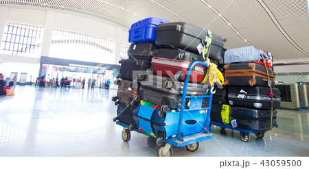 Many Colorful Luggage stack bags before loading 43059500